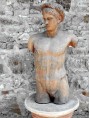 Torso di Apollo greco romano in terracotta