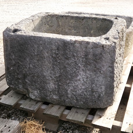 ancient rectangular white limestone tank for olive oil