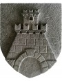 Coat of arms in stone fortress with tower